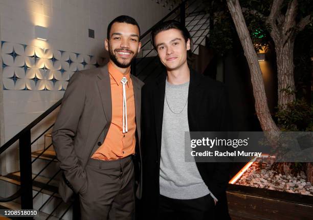 Justice Smith and Felix Mallard attend the Netflix Premiere of "All the Bright Places" on February 24, 2020 in Hollywood, California.