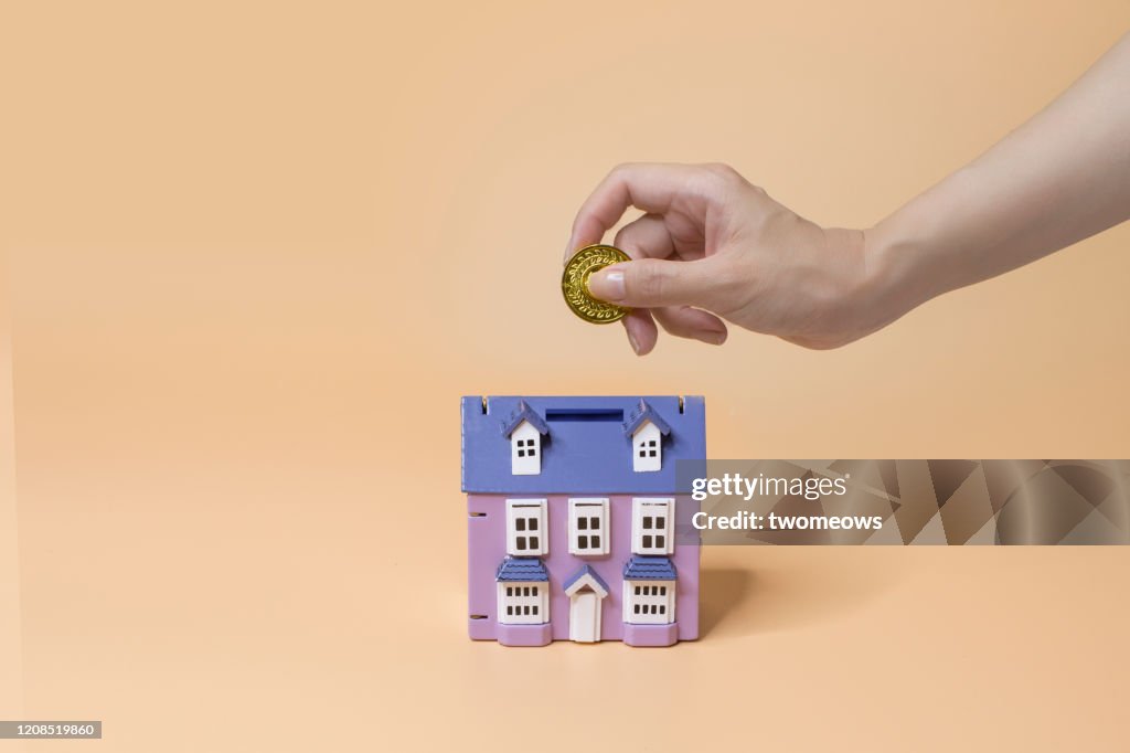 Financial planning for house ownership concept image.