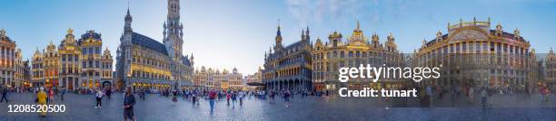 panoramic image of grand place (grote markt) central square of brussels - grand central square stock pictures, royalty-free photos & images