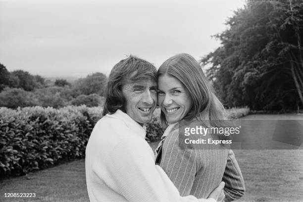British Formula One racing driver Jackie Stewart and his wife, Helen Stewart, at the Tyrrell base in Ockham, Surrey, England, 25th June 1972.