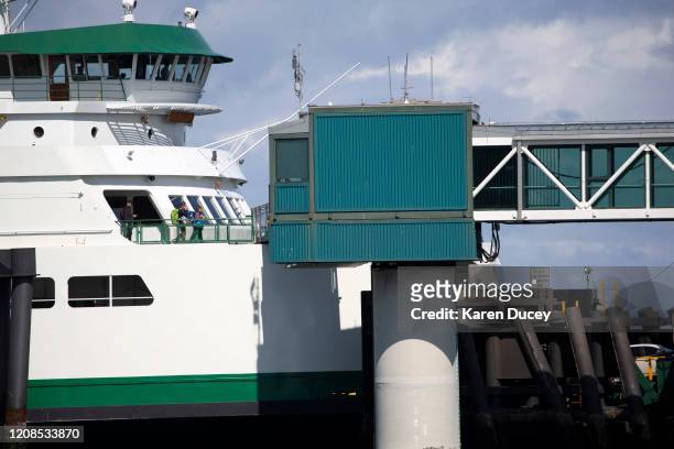 Washington State ferry pulls up to the dock on March 29, 2020 in Edmonds, Washington. Today, Washington State Ferries began a temporary reduction of...