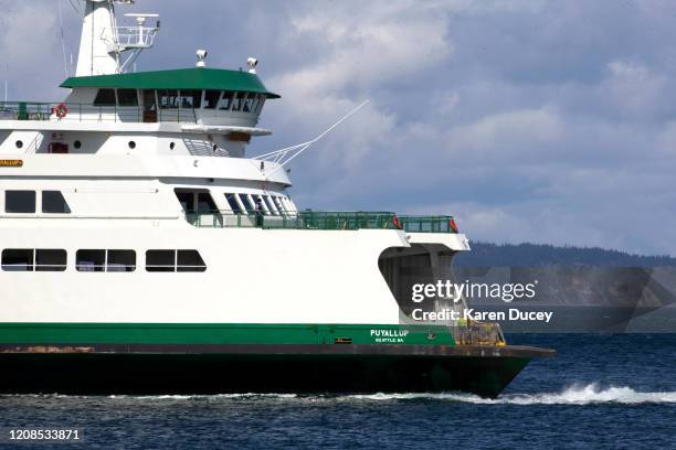 Washington State ferry pulls up to the dock on March 29, 2020 in Edmonds, Washington. Today, Washington State Ferries began a temporary reduction of...