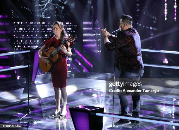 Marija Temo and Sammy Colon are seen performing on stage during Telemundo's "La Voz" Batallas Round 4 at Cisneros Studios on March 29, 2020 in Miami,...