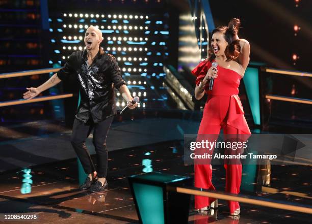 Jose Palacios and Eliana Sasic are seen performing on stage during Telemundo's "La Voz" Batallas Round 4 at Cisneros Studios on March 29, 2020 in...