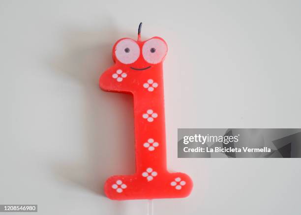 birthday candles with number one - birthday candle stock pictures, royalty-free photos & images