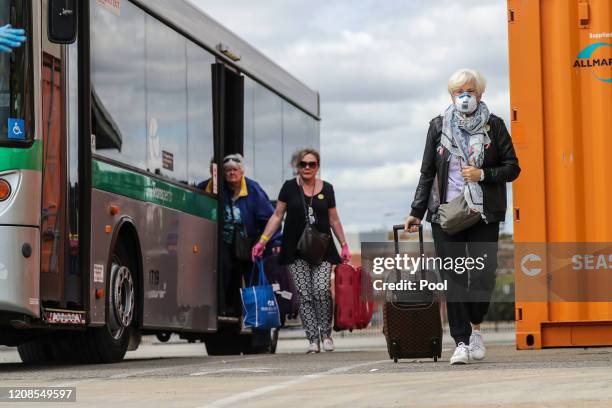 West Australian passengers disembark Vasco de Gama cruise ship and head to Rottnest Island for quarantine on March 30, 2020 in Fremantle, Australia....