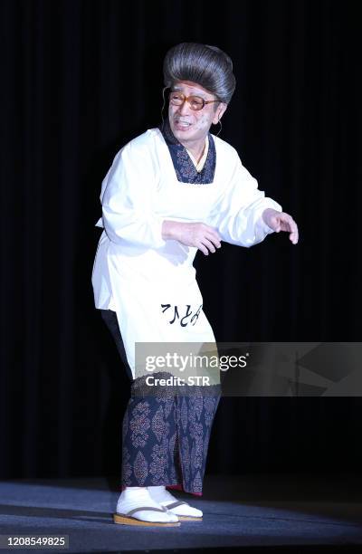 This picture taken on September 15, 2016 shows Japanese comedian Ken Shimura performing in Tokyo. - It was announced on March 30, 2020 that Shimura,...