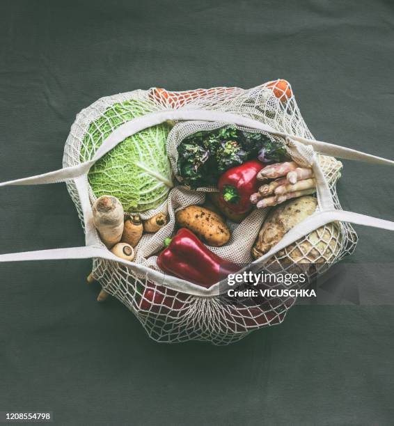 various vegetables in eco friendly mesh bags. top view - bag fresh stock pictures, royalty-free photos & images