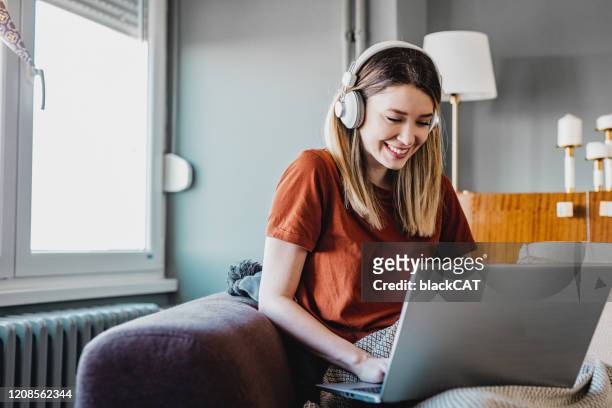 working from home - listening stock pictures, royalty-free photos & images