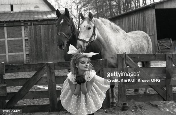 German singer Nina Hagen posed with a horse, Germany, circa 1980.
