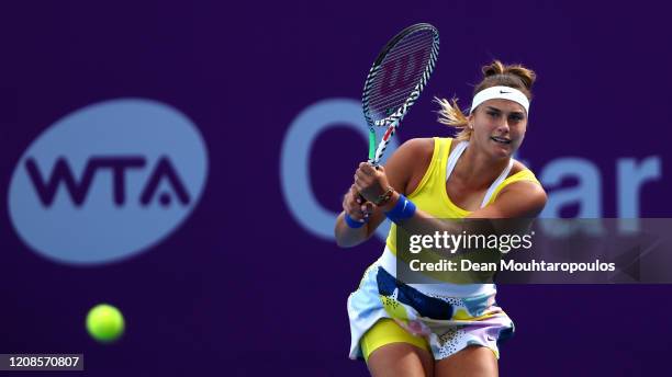 Aryna Sabalenka of Belarus returns a backhand against Anett Kontaveit of Estonia during Day 3 of the WTA Qatar Total Open 2020 at Khalifa...