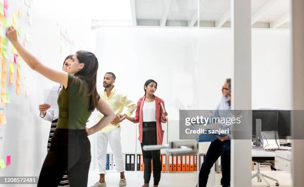 business people on a meeting - design studio stock pictures, royalty-free photos & images