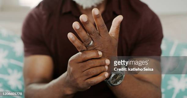 arthritis is terribly painful - arthritic hands stock pictures, royalty-free photos & images