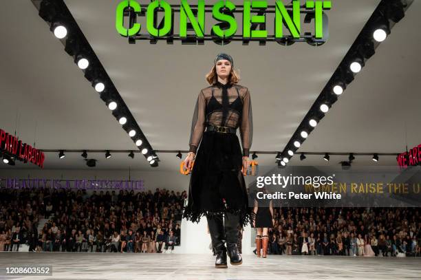 Cara Taylor walks the runway during the Dior show as part of the Paris Fashion Week Womenswear Fall/Winter 2020/2021 on February 25, 2020 in Paris,...