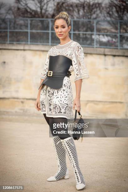 Helena Lunardelli wearing Dior dress, Dior corset, Dior saddle bag Dior white boots outside the Dior show as part of the Paris Fashion Week...