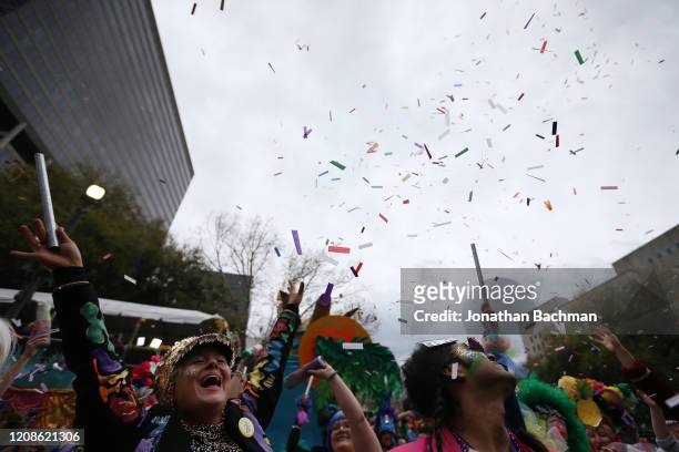 Members of the Mondo Kayo Social and Marching Club parade down St. Charles Avenue during Fat Tuesday celebrations on February 25, 2020 in New...