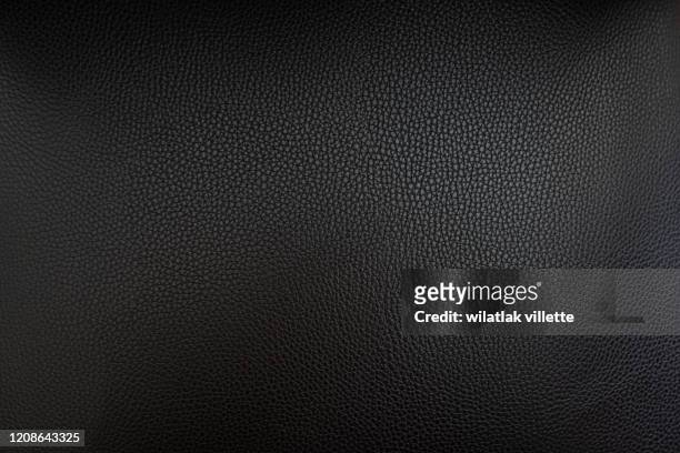close up black leather and texture background - black leather fotografías e imágenes de stock