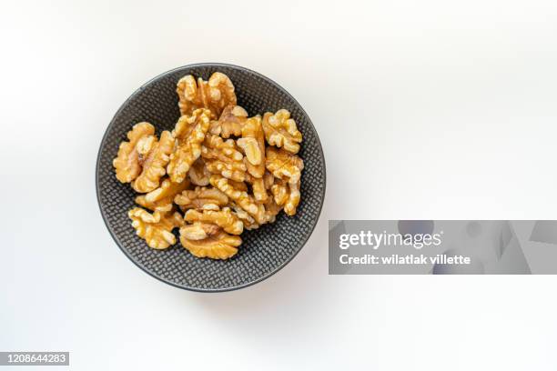 many nuts healthy fat and protein food and snack, ketogenic diet food - walnuts stock pictures, royalty-free photos & images