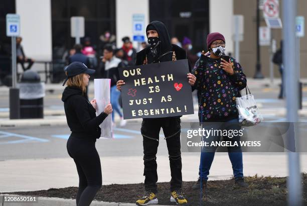 Amazon workers at Amazon's Staten Island warehouse strike in demand that the facility be shut down and cleaned after one staffer tested positive for...