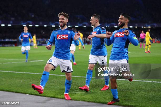 Dries Mertens of SSC Napoli celebrates with teammates Mario Rui and Lorenzo Insigne of SSC Napoli after scoring his teams first goal during the UEFA...