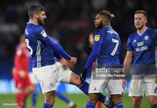 Cardiff players Callum Paterson kicks out at team mate Leandro Bacuna at the final whistle after the Sky Bet Championship match between Cardiff City...