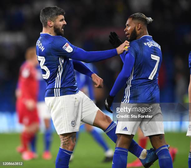 Cardiff players Callum Paterson kicks out at team mate Leandro Bacuna at the final whistle after the Sky Bet Championship match between Cardiff City...