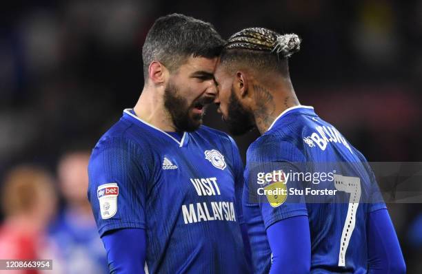 Cardiff players Callum Paterson and team mate Leandro Bacuna go head to head at the final whistle after the Sky Bet Championship match between...