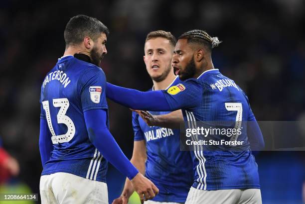 Cardiff player Callum Paterson is held by the throat by team mate Leandro Bacuna at the final whistle after the Sky Bet Championship match between...