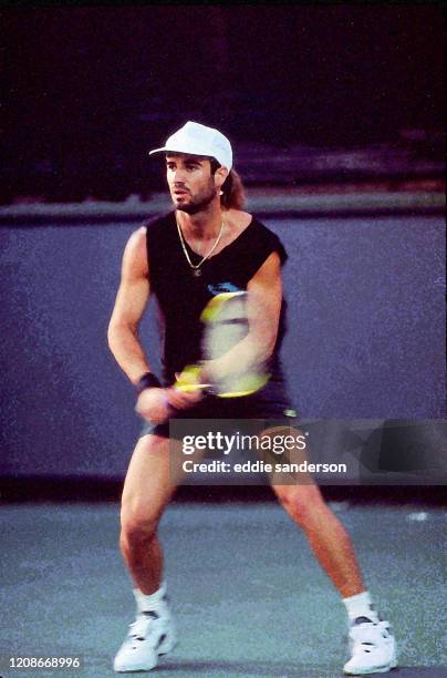 Tennis champion Andre Agassi playing in a tournament in Indian Wells, California in March 1989. Former Wimbledon Champion Agassi, known for his...