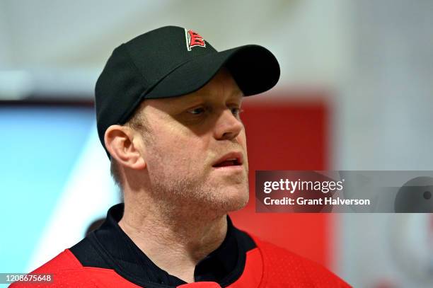 Dave Ayres greets fans during the game between the Dallas Stars and Carolina Hurricanes at at PNC Arena on February 25, 2020 in Raleigh, North...