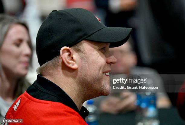 Dave Ayres greets fans during the game between the Dallas Stars and Carolina Hurricanes at at PNC Arena on February 25, 2020 in Raleigh, North...