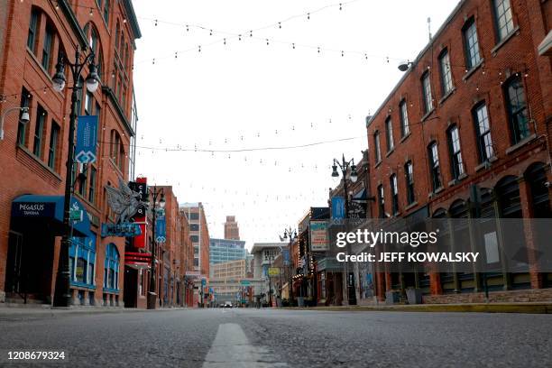 Monroe Street in Detroit's Greektown is pictured empty due to COVID-19 in Detroit, Michigan on March 30, 2020.