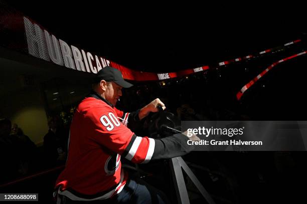 Dave Ayres sounds the warning siren during the game between the Dallas Stars and Carolina Hurricanes at at PNC Arena on February 25, 2020 in Raleigh,...