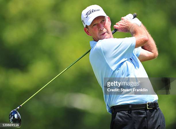 Larry Nelson hits a shot on the 14th hole during the first round of the 93rd PGA Championship at the Atlanta Athletic Club on August 11, 2011 in...