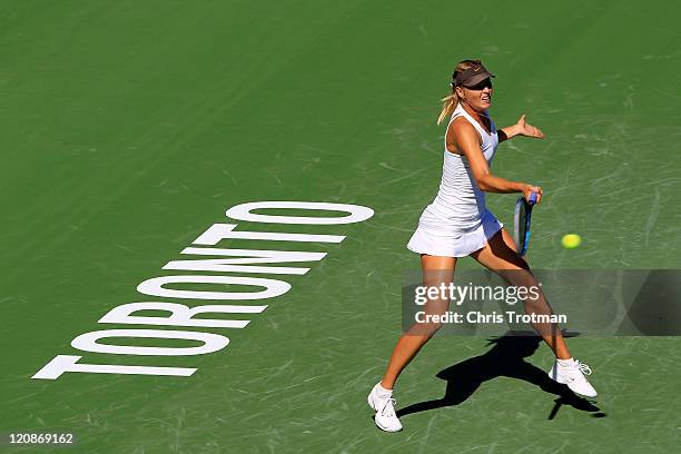 Maria Sharapova of Russia returns to Galina Voskoboeva of Kazakhstan on Day 4 of the Rogers Cup presented by National Bank at the Rexall Centre on...