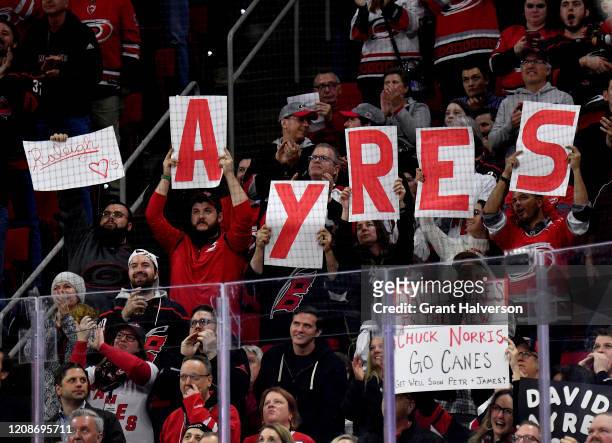 Fans cheer for Dave Ayres during the game between the Dallas Stars and Carolina Hurricanes at at PNC Arena on February 25, 2020 in Raleigh, North...