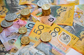 Australian notes and coins spilled out.
