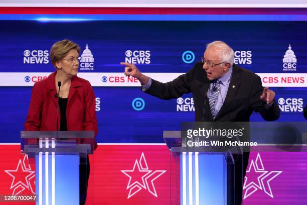 Democratic presidential candidates Sen. Elizabeth Warren and Sen. Bernie Sanders participate in the Democratic presidential primary debate at the...