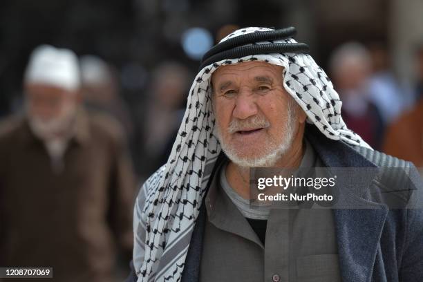 An elderly Palestinian man wearing keffiyeh seen in the Muslim Quarter of the Old City of Jerusalem. On Wednesday, March 11 in Jerusalem, Israel.