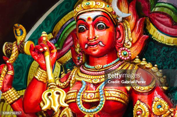a colorful statue of a hindu goddess - lakshmi puja stock pictures, royalty-free photos & images