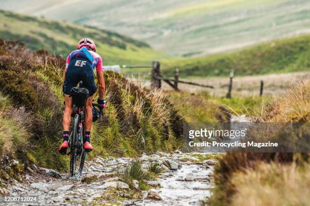 Portrait of Australian professional road racing cyclist Lachlan Morton, photographed near Nant-y-moch Reservoir reservoir in Wales during the GBDuro...