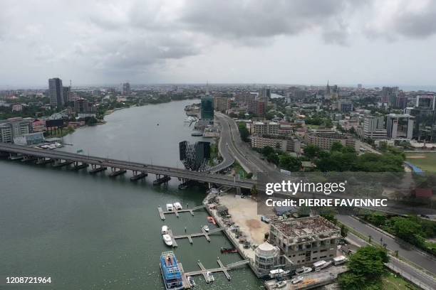 An aerial view shows empty streets in Lagos on March 31, 2020. - Lagos was deserted on March 31 after Nigeria locked down its economic hub and...