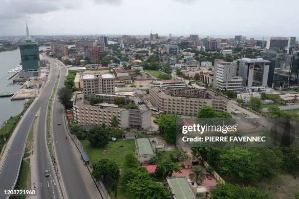 An aerial view shows empty streets in Lagos on March 31, 2020. Lagos was deserted on March 31 after Nigeria locked down its economic hub and...