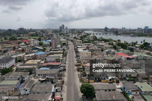 An aerial view shows empty streets in Lagos on March 31, 2020. - Lagos was deserted on March 31 after Nigeria locked down its economic hub and...