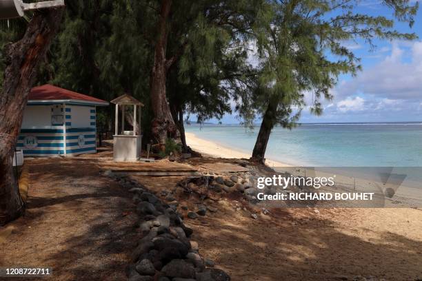 This picture taken on March 31, 2020 shows empty Sain-Gilles de la Reunion beaches, on the French overseas department of La Reunion, beach...