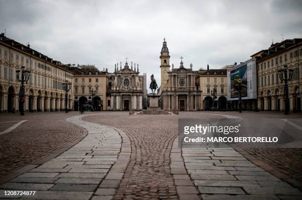 View shows a deserted Piazza San Carlo on March 31, 2020 in Turin, during the country's lockdown aimed at curbing the spread of the COVID-19...
