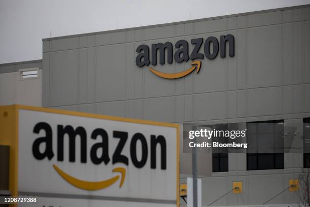 Amazon.com Inc. Signage is displayed in front of a warehouse in the Staten Island borough of New York, U.S., on Tuesday, March 31, 2020. Some...