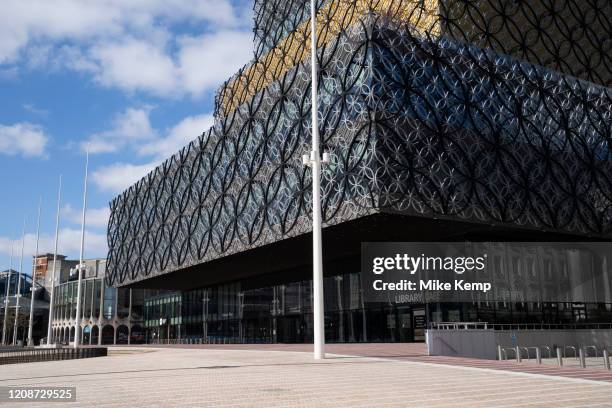 Centenary Square and the Library of Birmingham in Birmingham city centre is virtually deserted due to the Coronavirus outbreak on 31st March 2020 in...