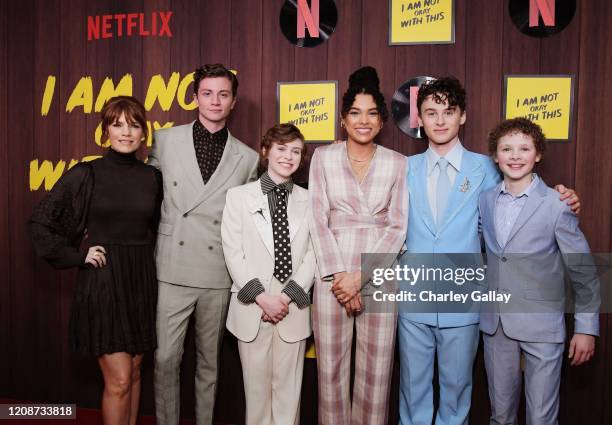 Kathleen Rose Perkins, Richard Ellis, Sophia Lillis, Sofia Bryant, Wyatt Oleff, and Aidan Wojtak-Hissong attend the premiere of Netflix's "I Am Not...