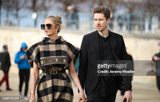 Romee Strijd and Laurens van Leeuwen are seen wearing a complete Dior look outside Dior during Paris Fashion Week - Womenswear Fall/Winter 2020/2021...